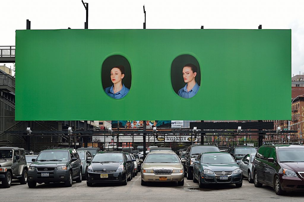 A billboard highlighting the act of looking at the High Line